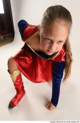 VIKY SUPERGIRL KNEELING POSE